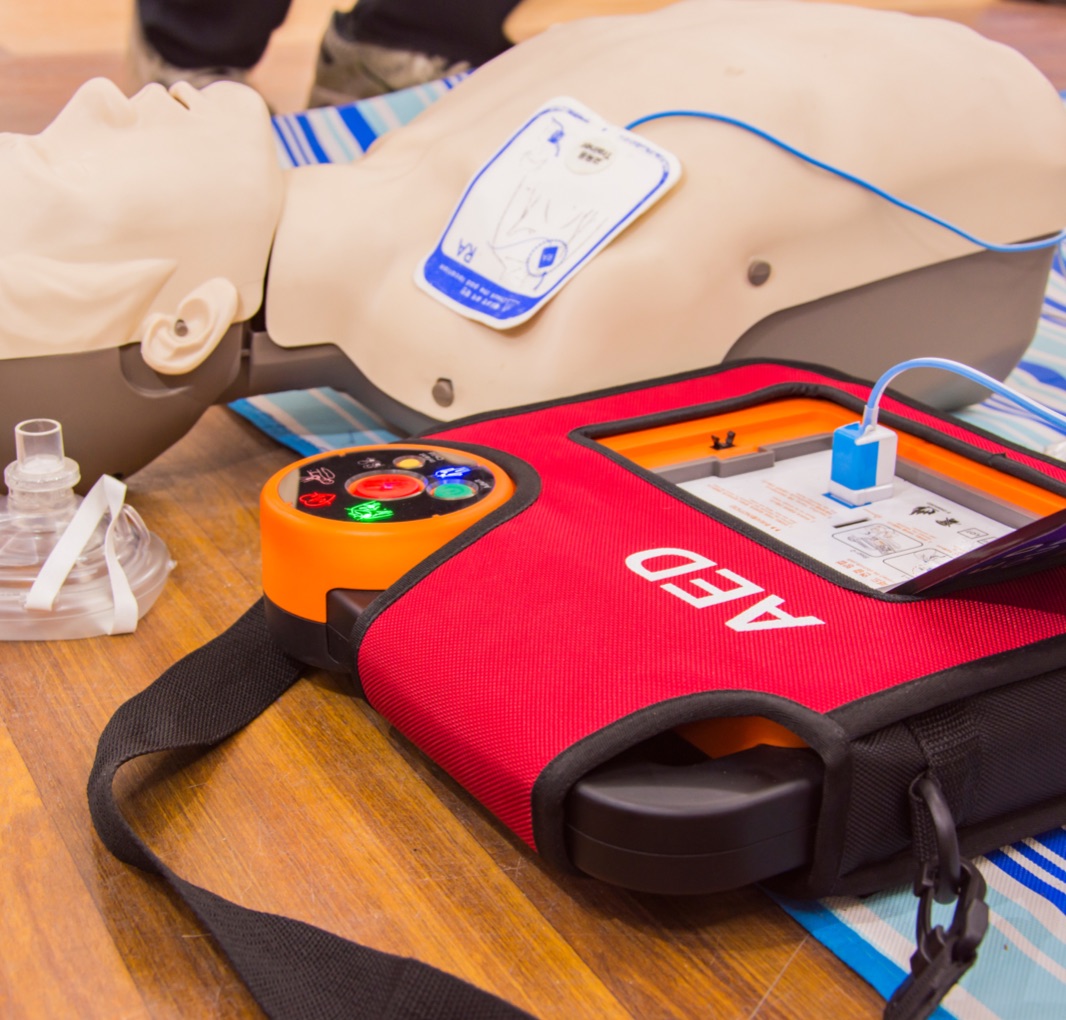 Wall-mounted AED maintained under Denver AED services